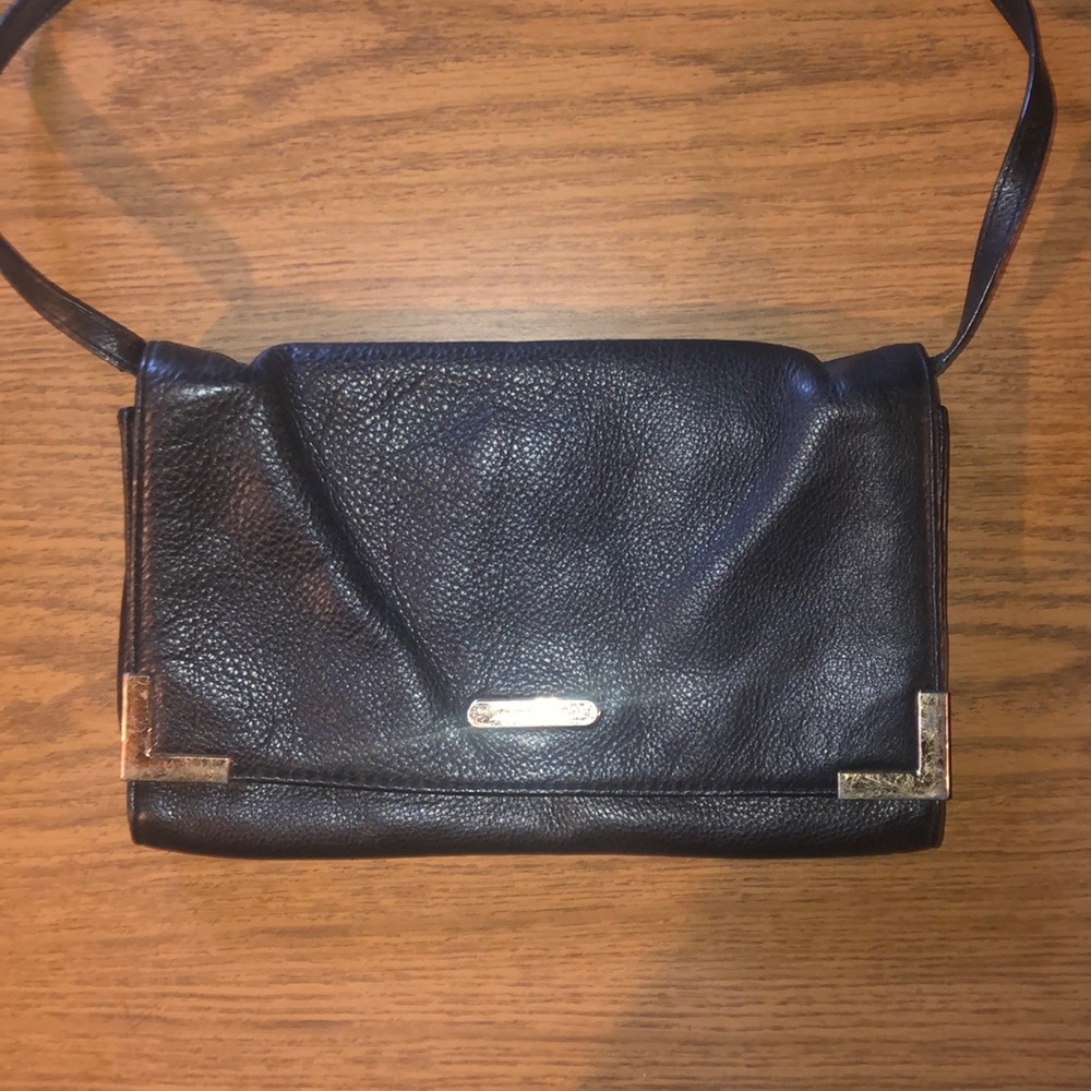 Michael Kors strapped clutch